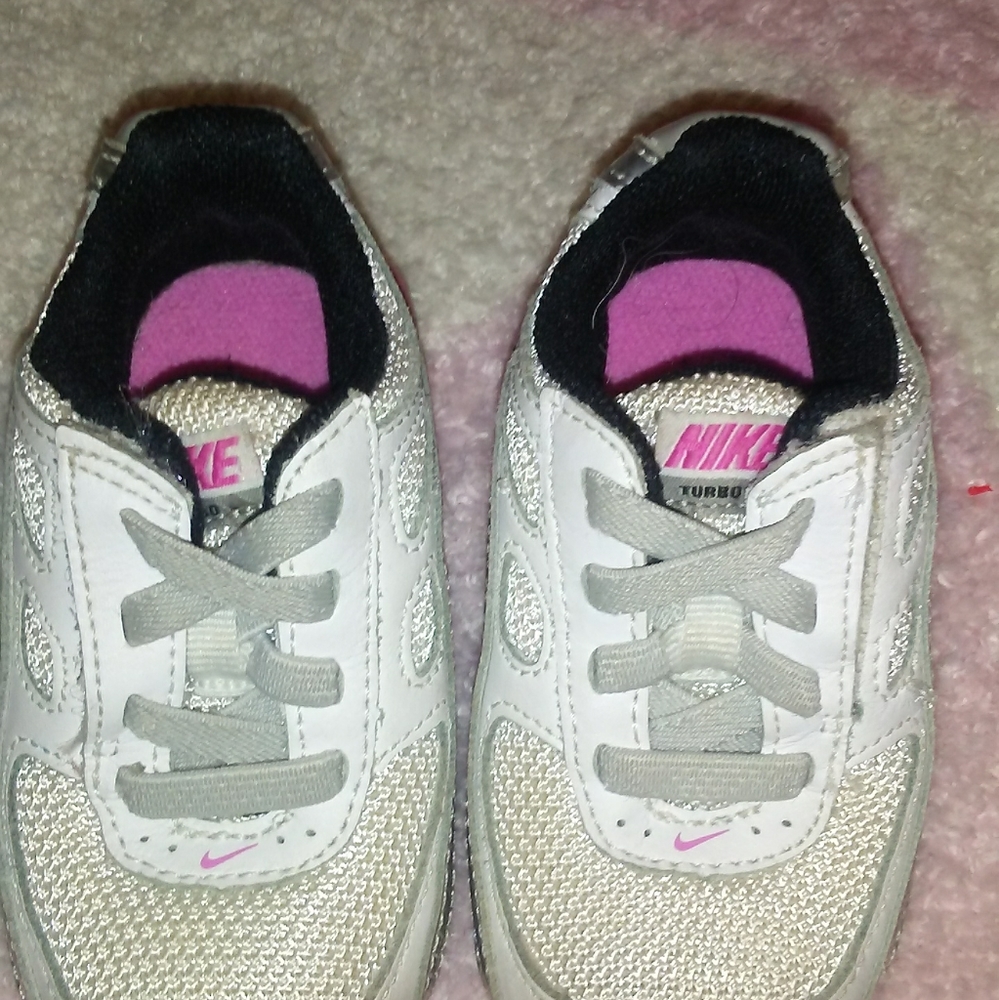 Baby girl Nike shocks.